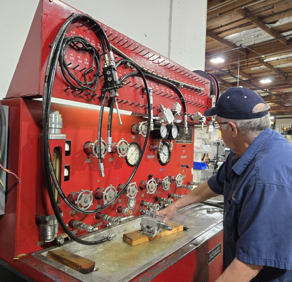 WIT Technician Tests a Hydraulic Manifold